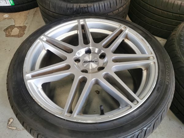 18" CALIBRE TOUCHDOWN ALLOY WHEELS / TYRES - 5 X 112 - Image 1